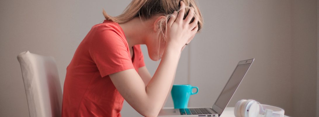woman-in-red-t-shirt-survivors-guilt